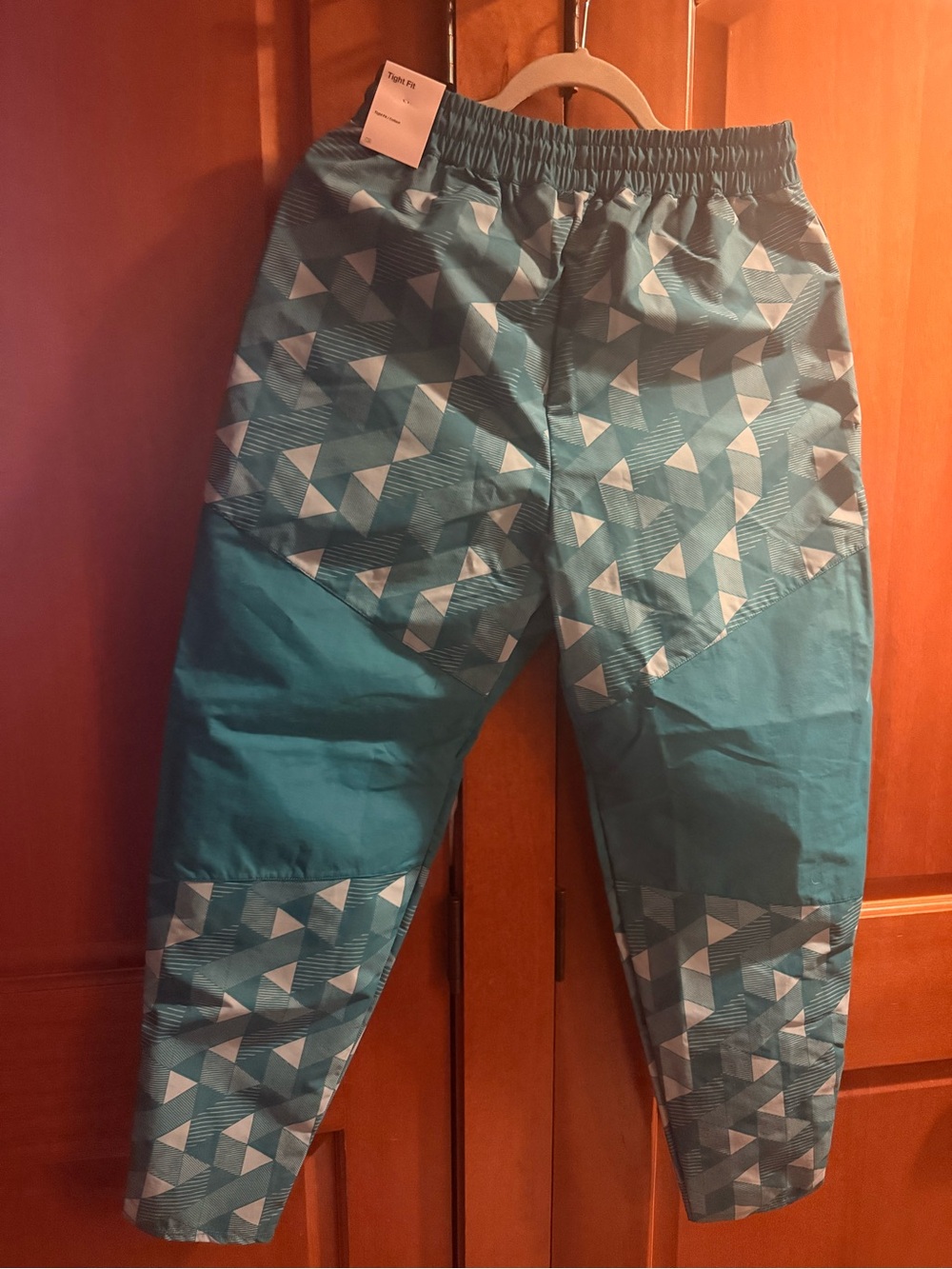 Nike woman’s Teal Geometric Joggers with Yellow Logo - Picture 2 of 3